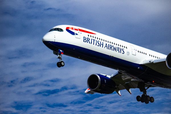 A plane belonging to British Airways, call sign SPEEDBIRD. Photo by <a href="https://unsplash.com/@isaacstruna?utm_source=unsplash&utm_medium=referral&utm_content=creditCopyText">Isaac Struna</a> 