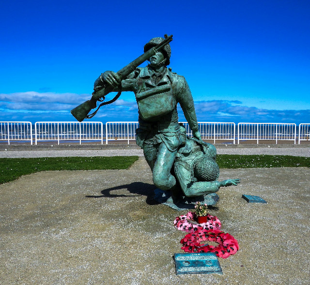 Statue at Colleville-sur-Mer, Normandy, France. Photo by <a href="https://unsplash.com/@mark_lawson?utm_content=creditCopyText&utm_medium=referral&utm_source=unsplash">Mark Lawson</a>