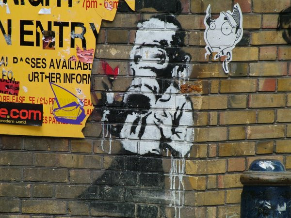 Photo of "Banksy" art taken by Matt Whitby in Brick Lane, East End, 2004.